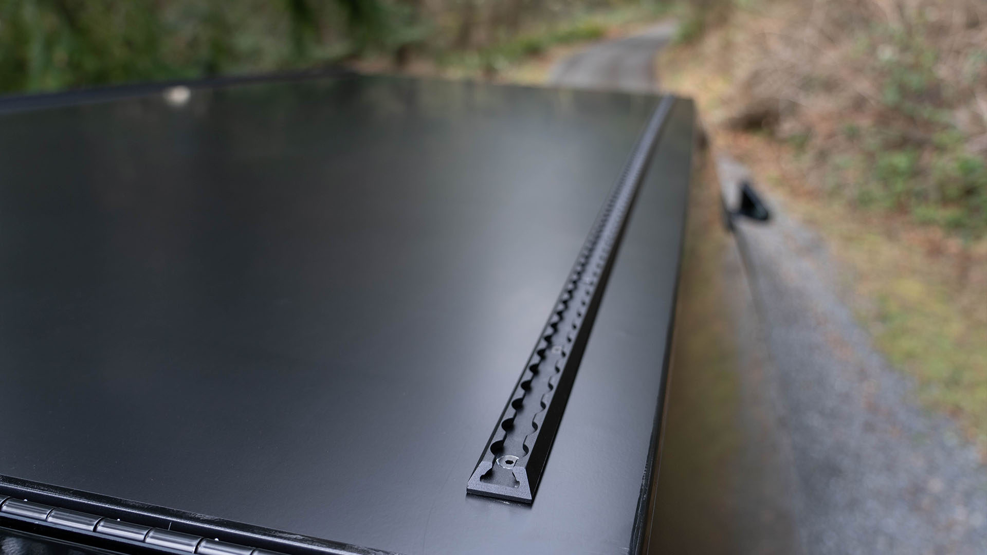 L-track roof runners are built into The Cap